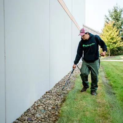 Commercial Landscaping Crew Maintenance Spraying Weeds Lawn Care Photo