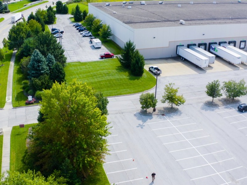 aerial photo of commercial property with lots of trees