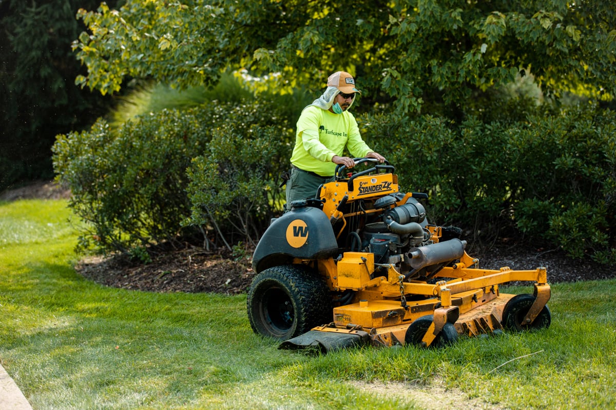 Maintenance crew mowing