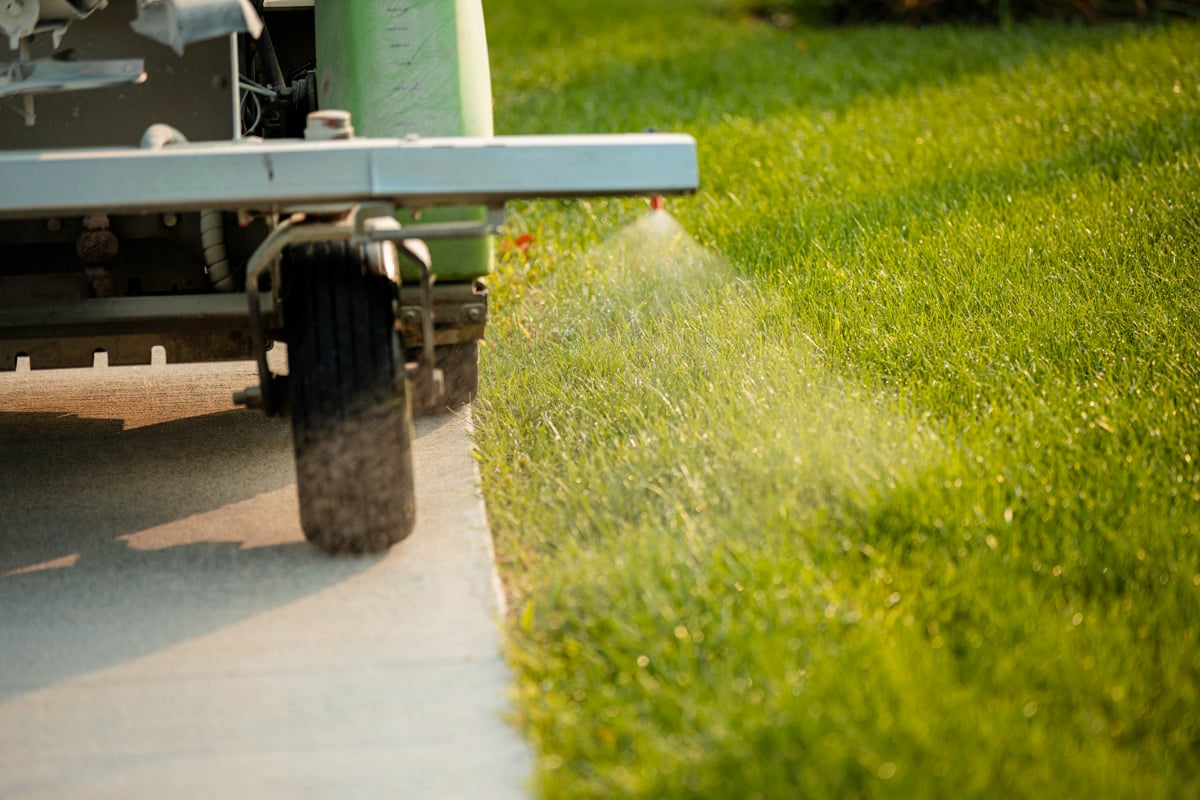 Commercial Landscaping Hospital Lawn Care Crew Technician Liquid Spraying Fertilization