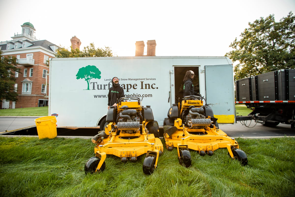 Lawn care technicians getting ready to mow