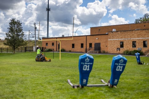 Athletic field mowing