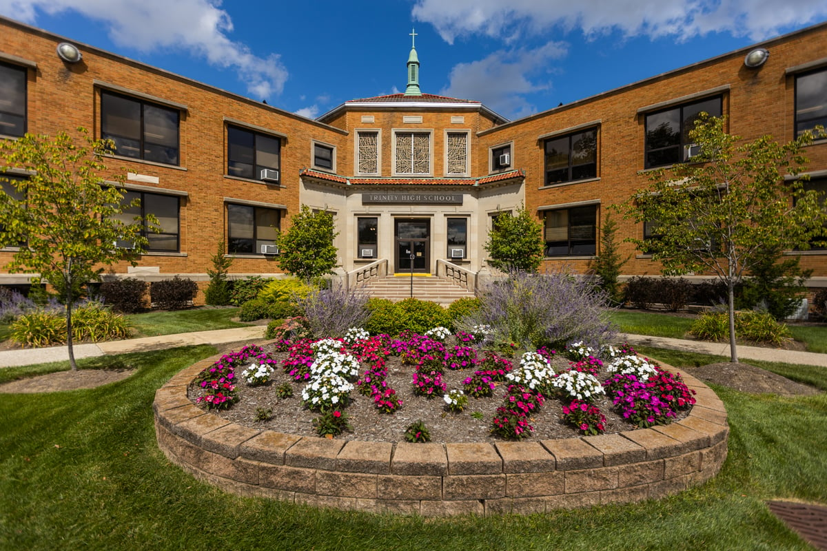 landscaping bed in front of school with flowers