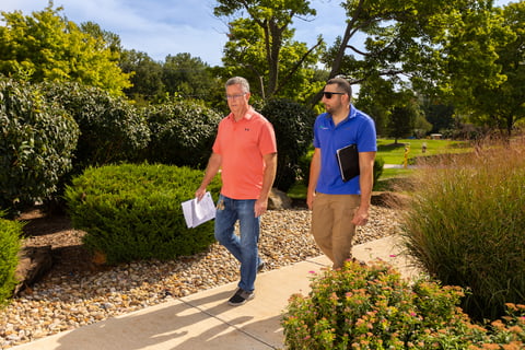 account manager and customer walking 3
