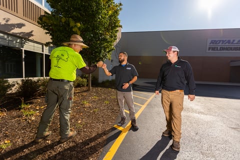 account manager with customer and crew