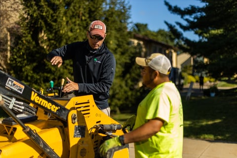 crew and account manager with machine