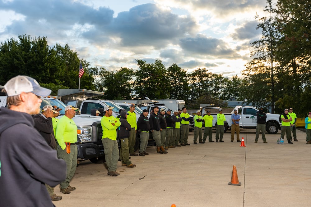 crew meeting outside for meeting 1