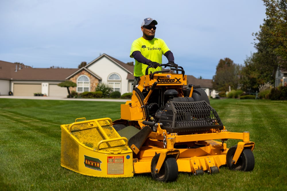 crew mowing green grass 2