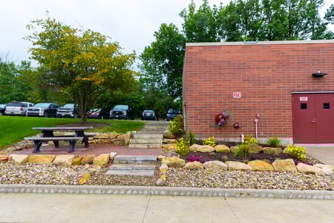 paver steps along building picnic table