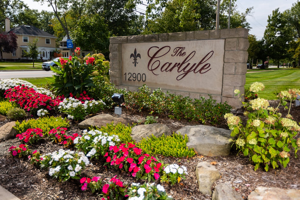 Carlyle entrance sign enhancement with flowers