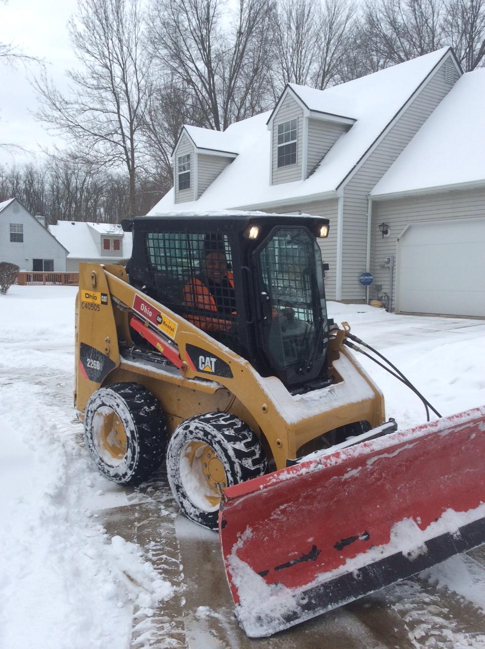 skid loader to remove snow 