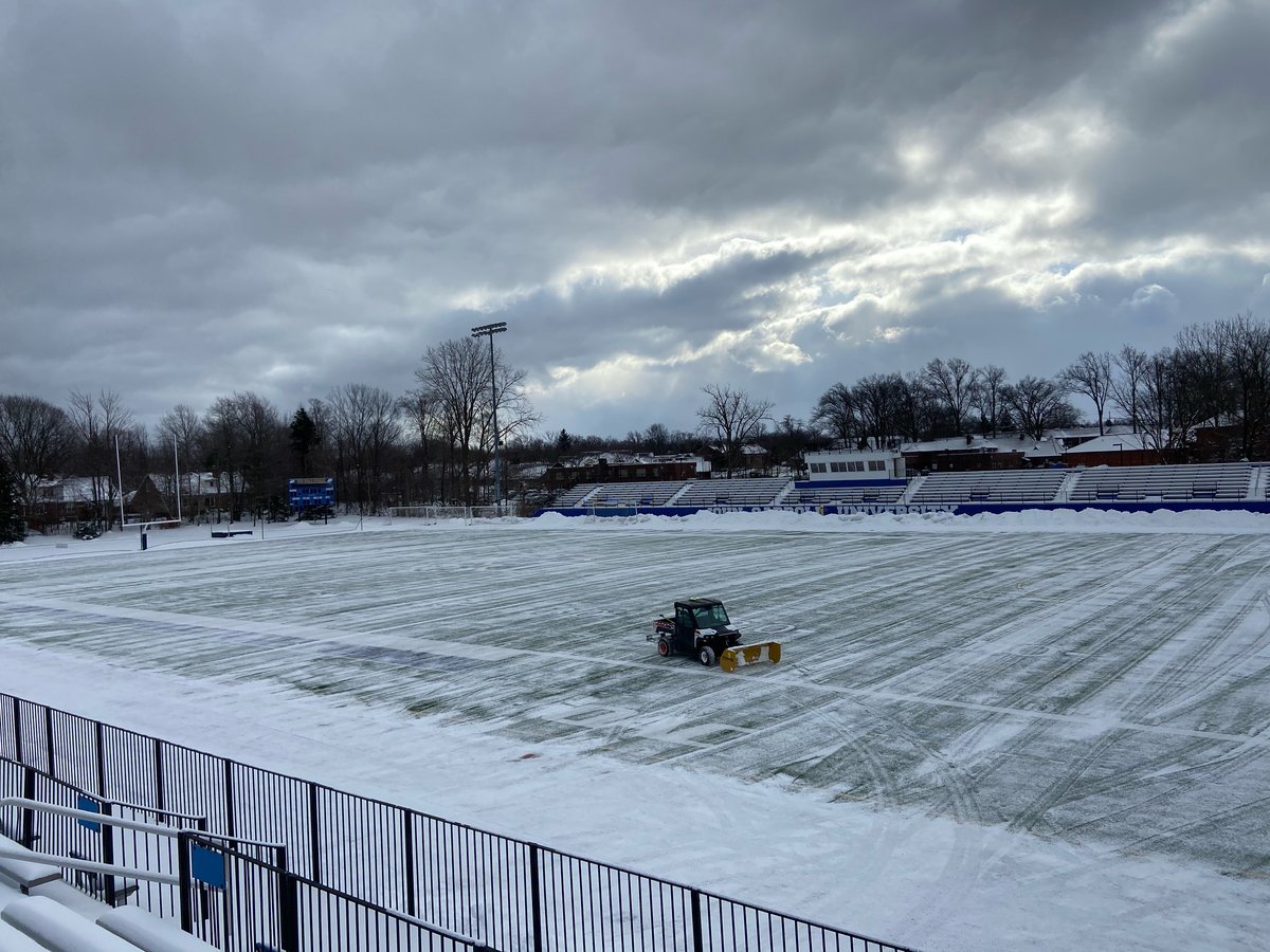 snow removal on commercial football field