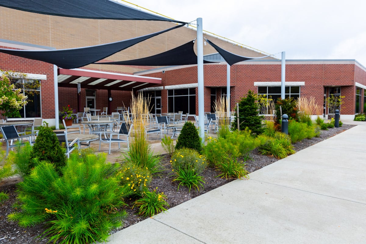 Landscape beds around outdoor seating area